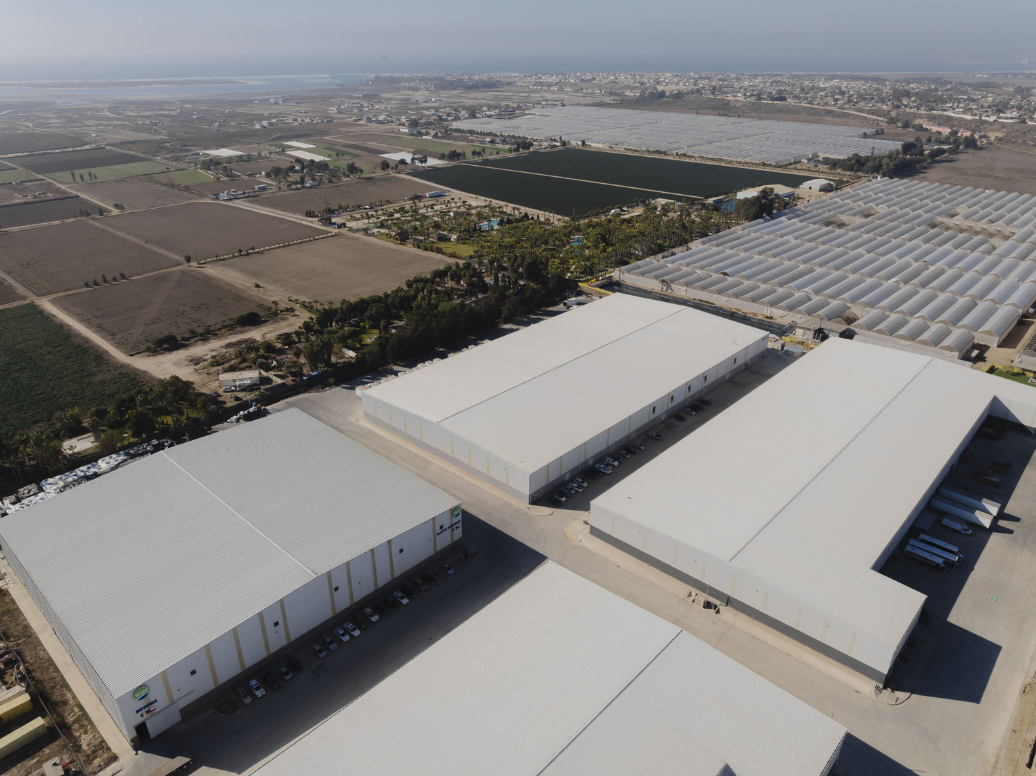 A wide shot of several factories.